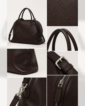 Detalhes da bolsa feminina de couro marrom Vivienne, com textura do couro, alças, fivela, mosquetão e fechamento por zíper.