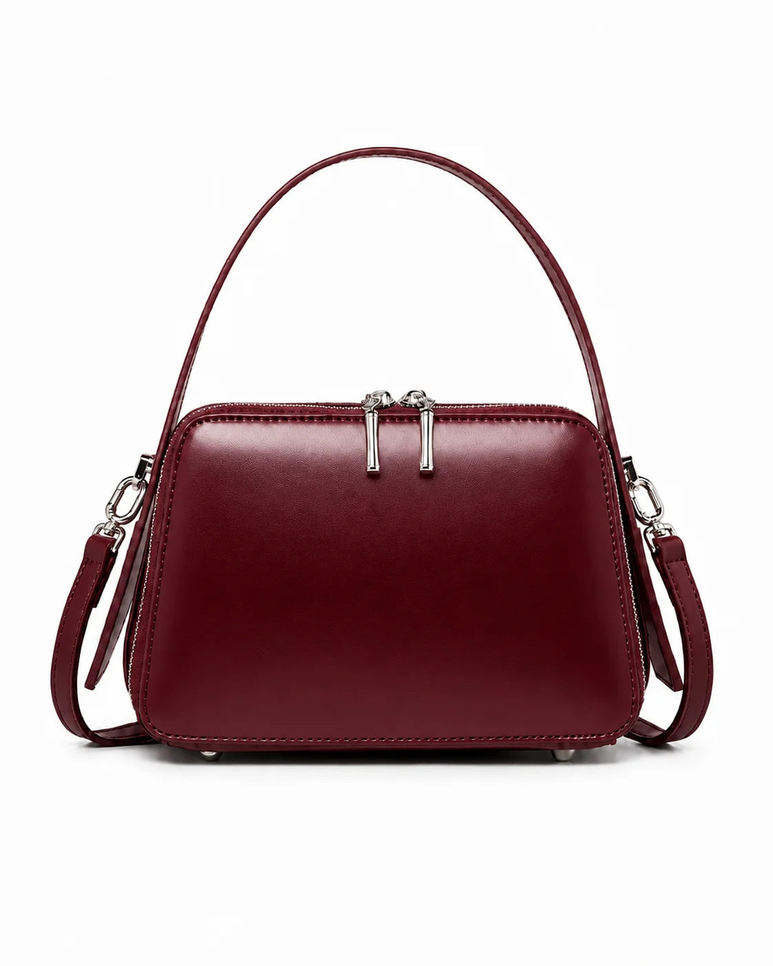 Bolsa feminina de couro marsala Elyra, vista frontal, com alça de mão, alça transversal removível, ferragens prateadas e fechamento superior em zíper.