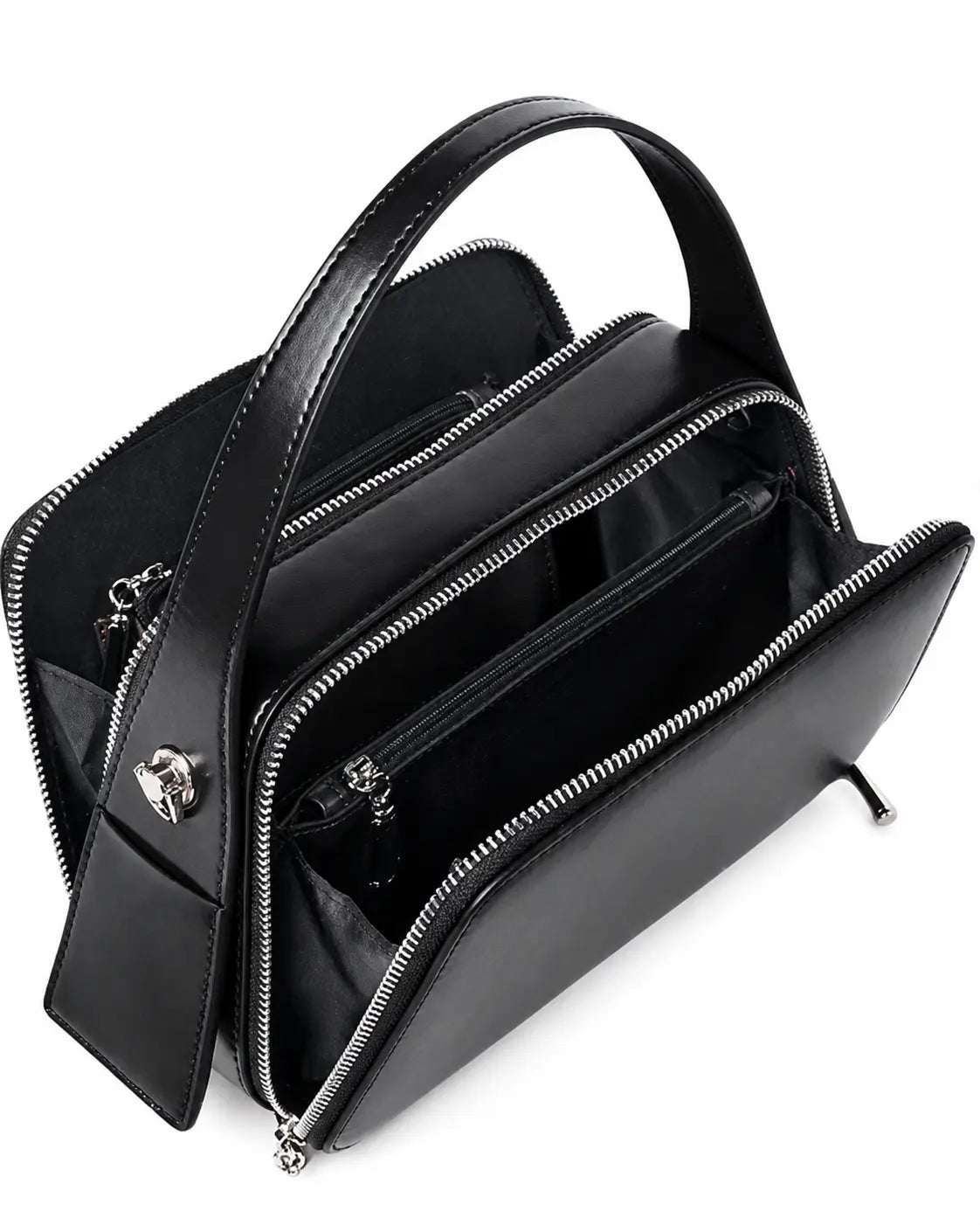 Bolsa feminina de couro preta Elyra aberta, mostrando os compartimentos com zíper, as divisórias e os bolsos internos para organização.