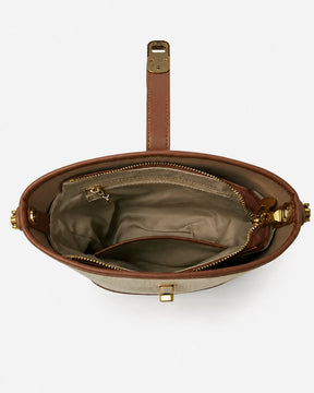Bolsa feminina de ombro bege Lisette aberta, mostrando o compartimento principal, o forro claro e os bolsos internos, incluindo um com zíper.
